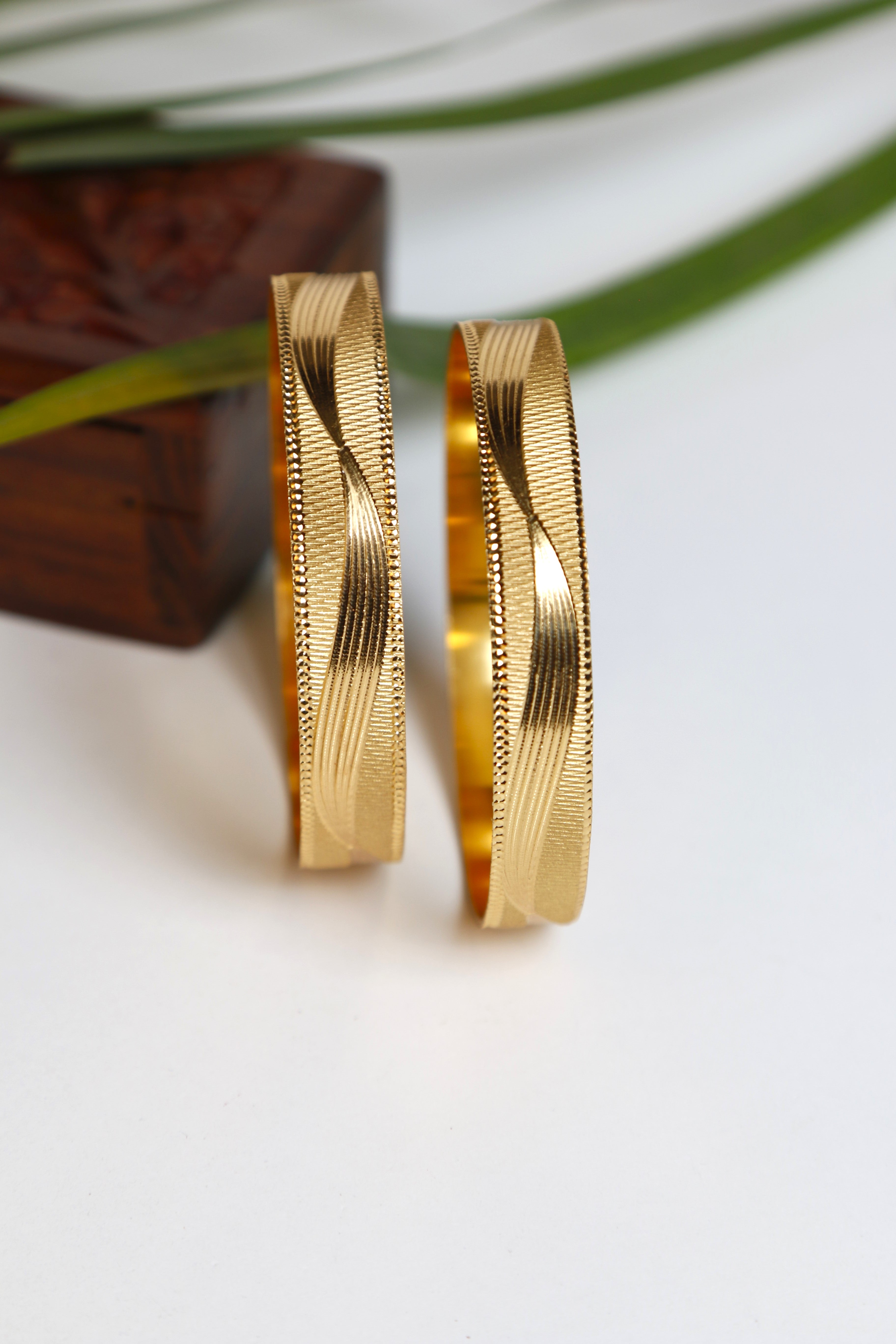 Gold Bangle Set with Sleek Wavy Design
