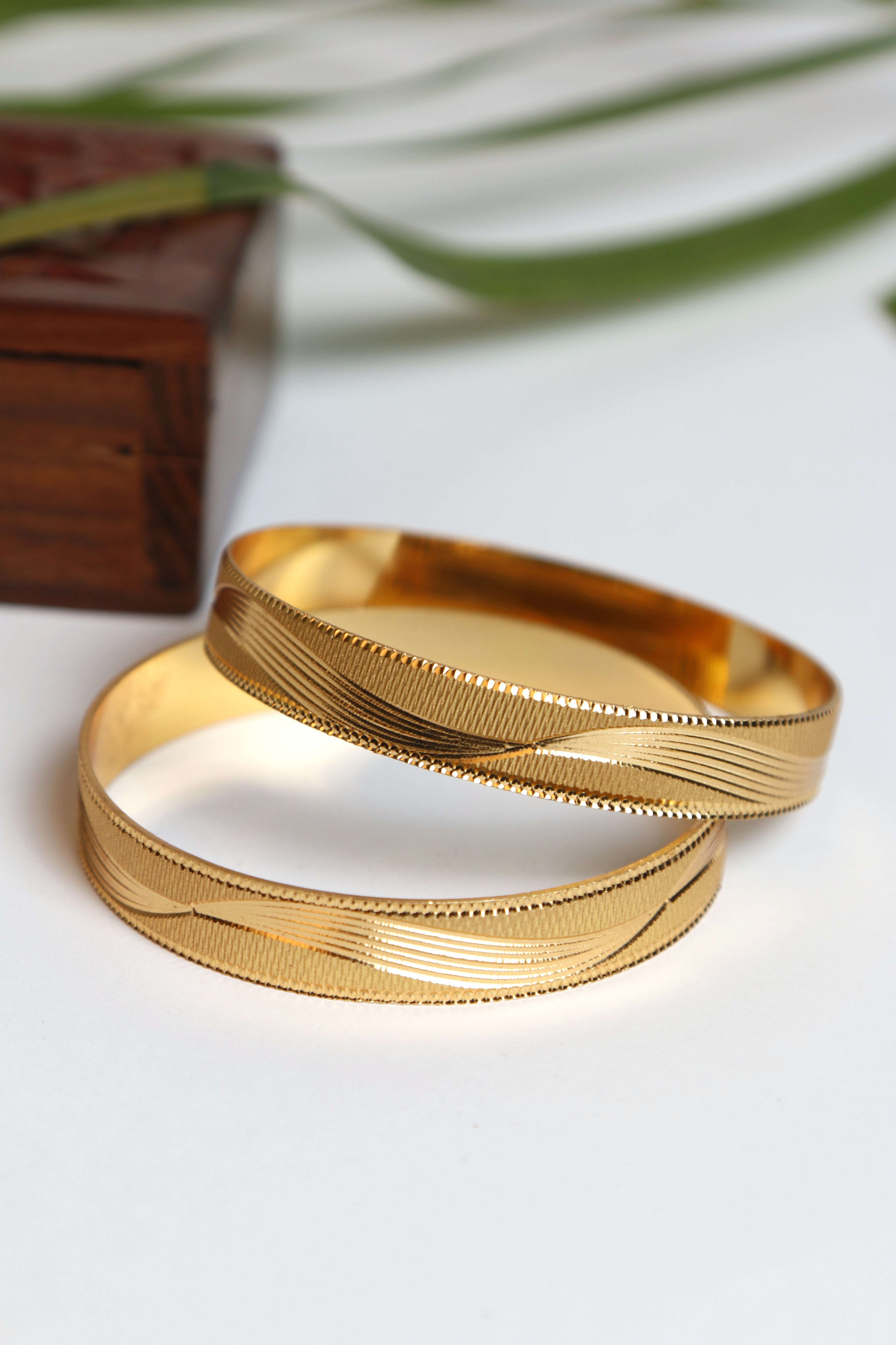 Gold Bangle Set with Sleek Wavy Design