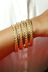 Gold Bangle Set with Geometric Pattern and Beaded Design