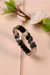 Hypoallergenic leaf-design Kada bracelet.
