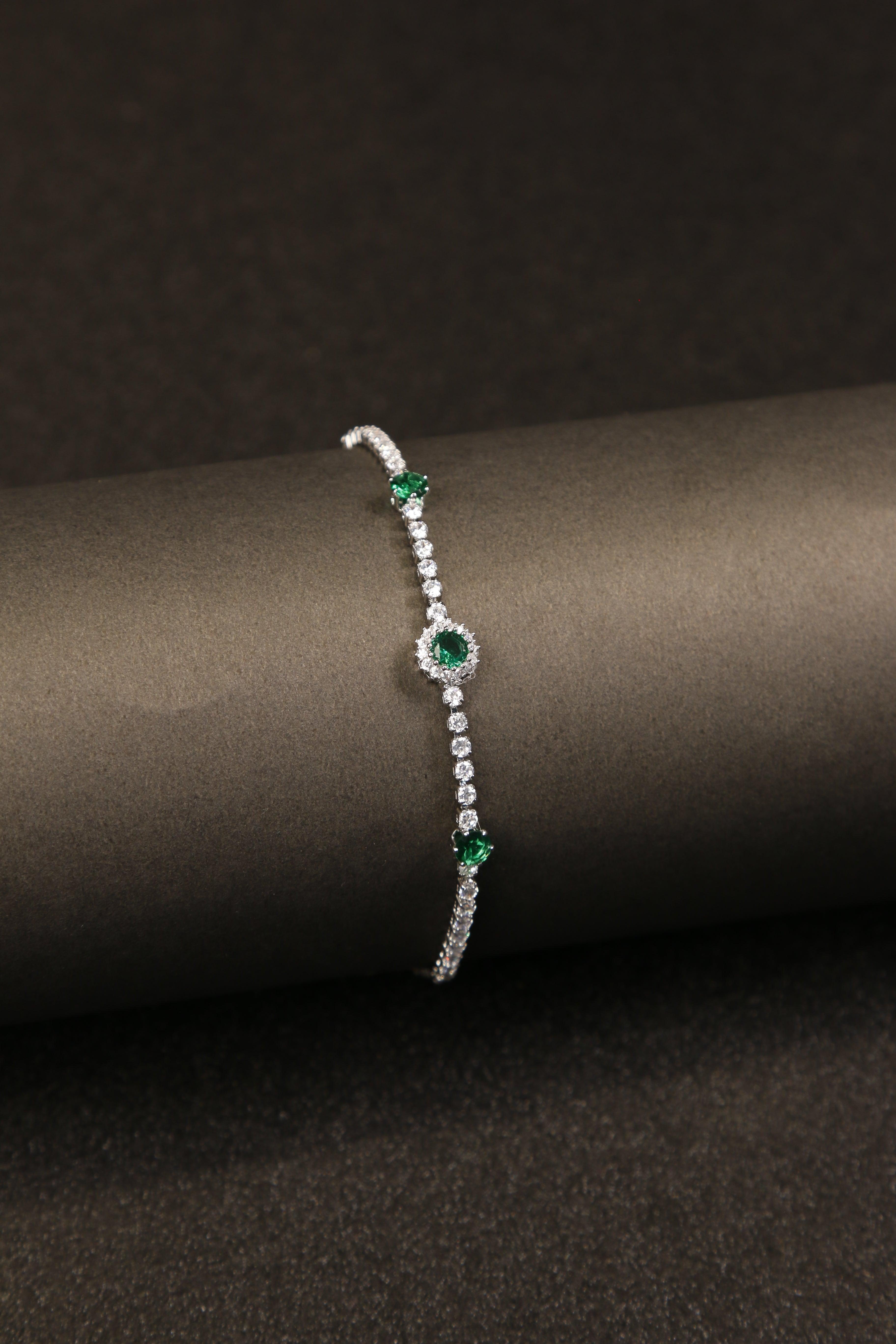 Elegant anti-tarnish bracelet with vivid green stones.