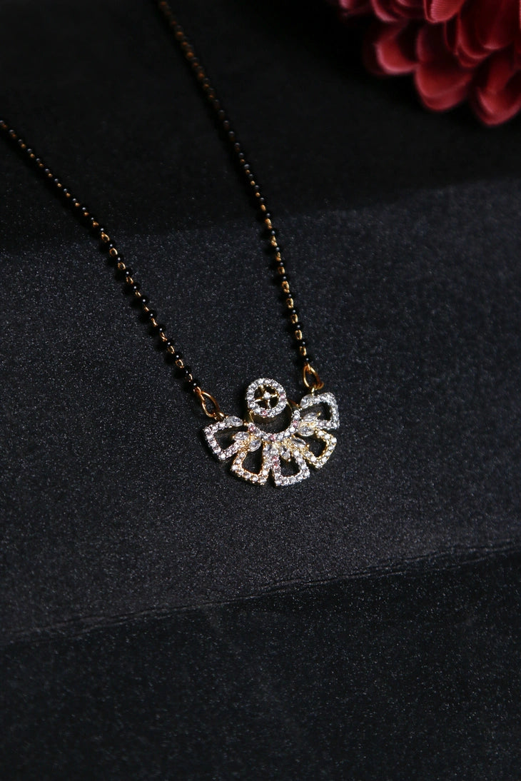 Fan-shaped mangalsutra pendant with diamonds and gold polish