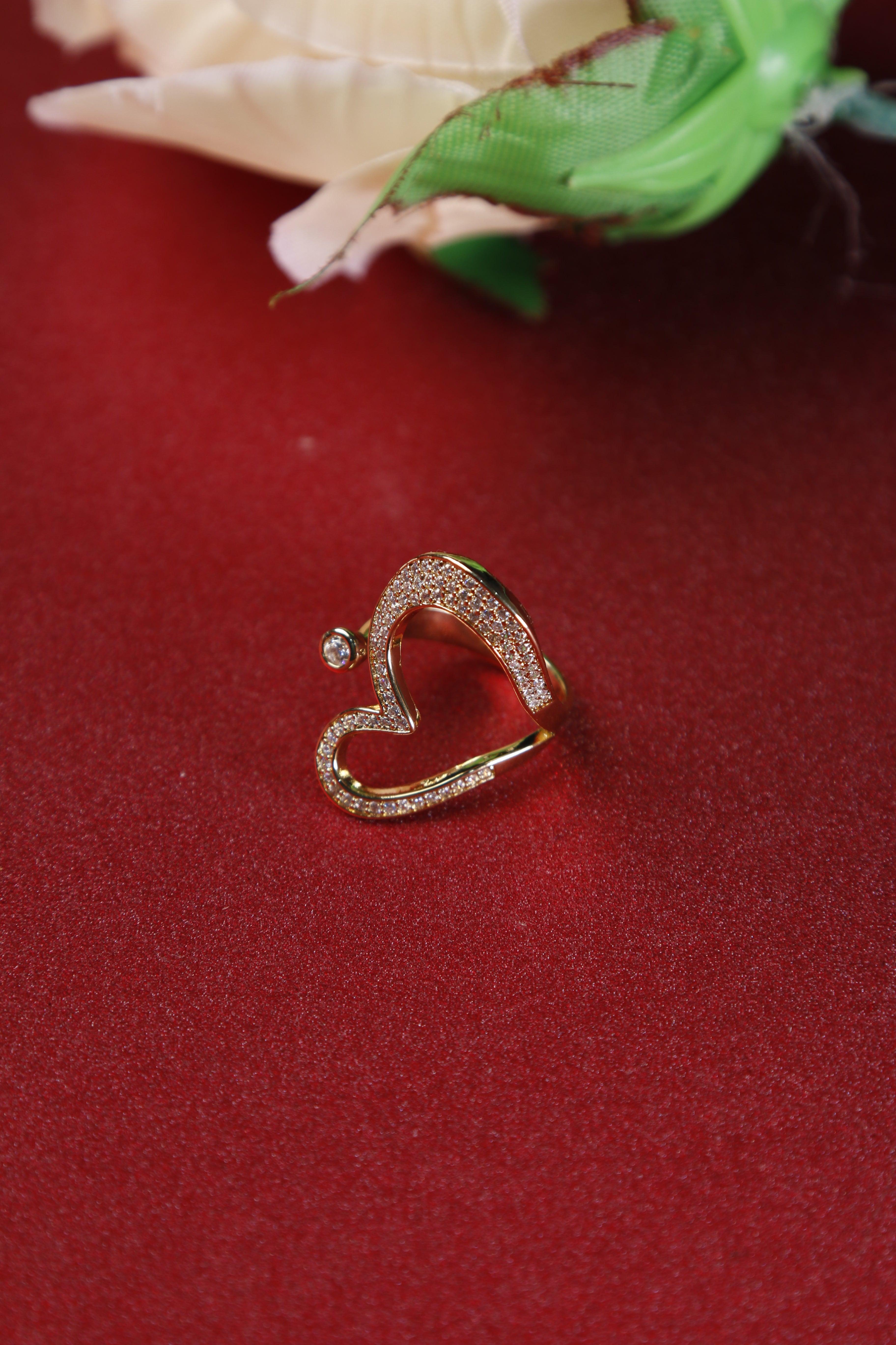 heart-ring-for-women-on-red-background