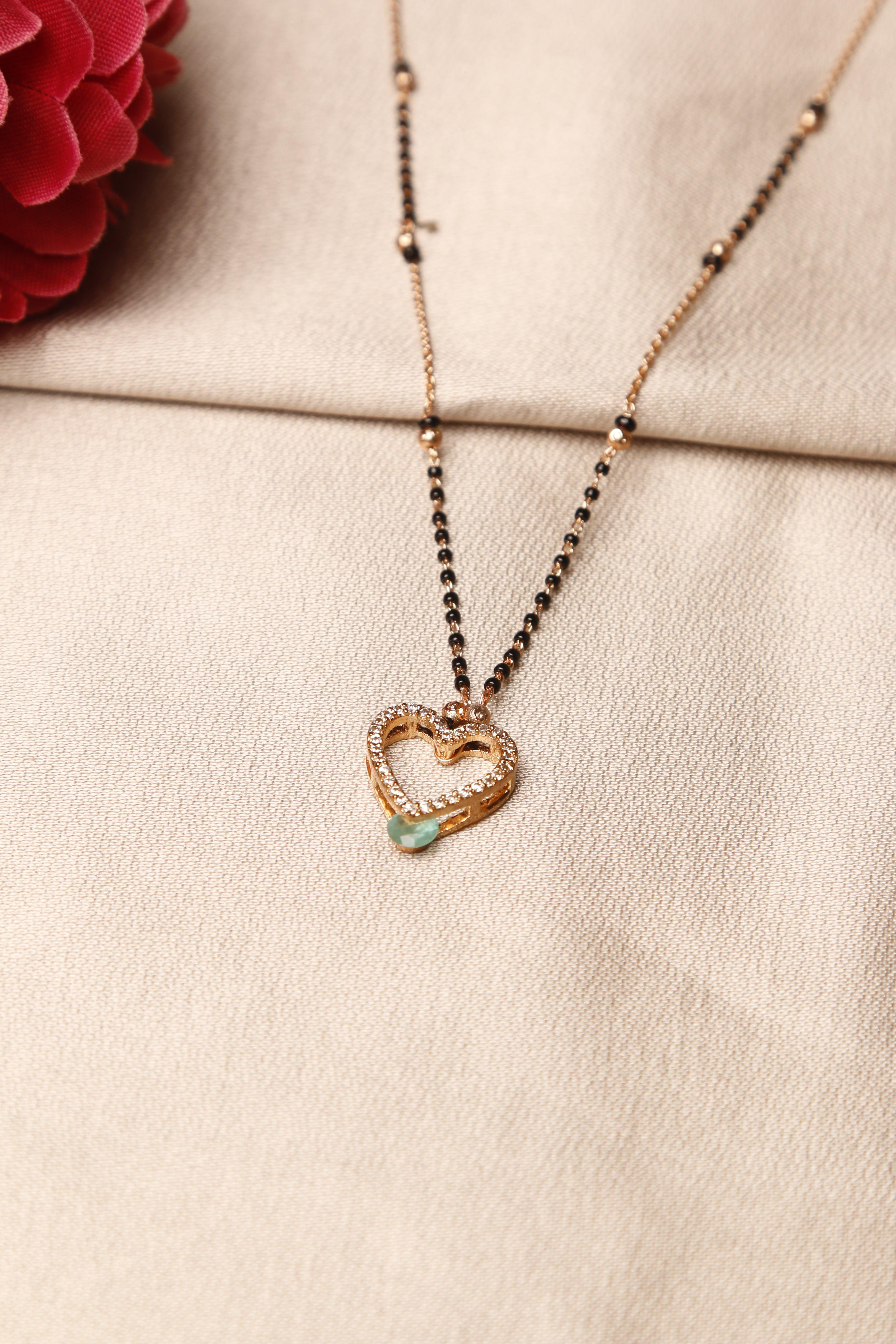 Gold heart-shaped mangalsutra