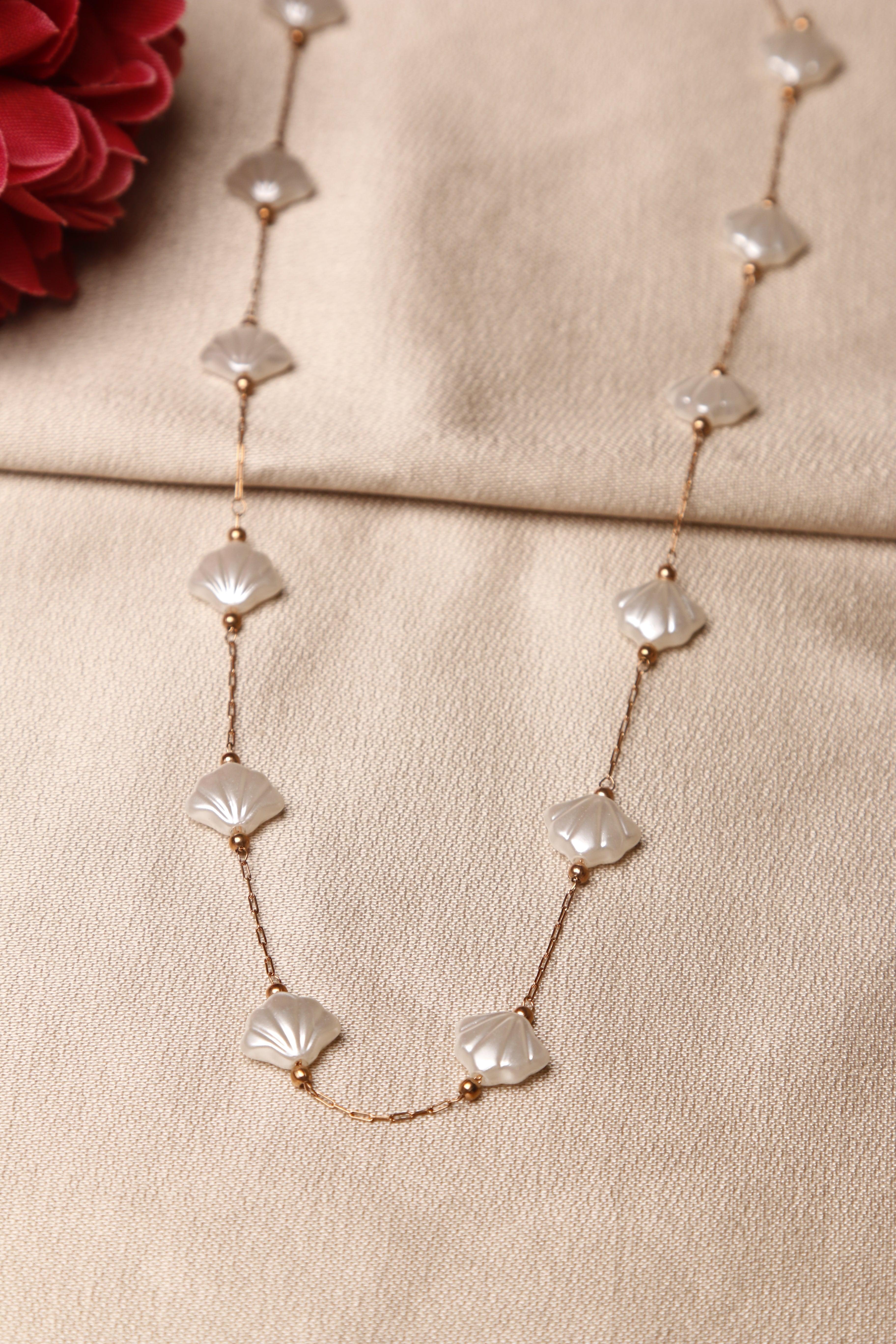 A close-up of a pearl necklace.